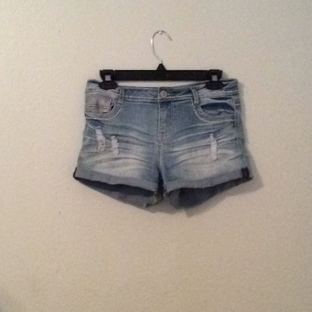 Blue ripped shorts